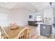 Open-concept living and dining areas with modern lighting and neutral decor at 2836 Rosemeade Dr, Monroe, NC 28110