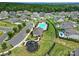 Beautiful aerial view of a community with a pool, clubhouse, and playground at 3255 Split Rail Ln, Lancaster, SC 29720