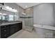 Elegant main bathroom with a walk-in shower, soaking tub, and granite vanity at 3255 Split Rail Ln, Lancaster, SC 29720