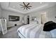 Comfortable main bedroom featuring a ceiling fan, carpet, and access to the bathroom and closet at 3255 Split Rail Ln, Lancaster, SC 29720