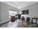 Spacious office with hardwood floors, a chandelier, and a large window providing ample natural light at 3255 Split Rail Ln, Lancaster, SC 29720