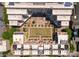 Bird's eye view showcasing the building's unique layout, courtyard, and surrounding cityscape, emphasizing the property's location at 400 N Church St # 422, Charlotte, NC 28202