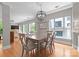 Dining area with modern lighting, seating for six, and large windows offering natural light at 400 N Church St # 422, Charlotte, NC 28202