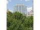 Modern high-rise condominium building featuring balconies and numerous windows at 400 N Church St # 422, Charlotte, NC 28202