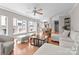 Bright living room with large windows, hardwood floors and neutral decor, perfect for relaxing or entertaining at 400 N Church St # 422, Charlotte, NC 28202