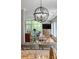 Open-concept living area filled with natural light and features modern furnishings and hardwood floors at 400 N Church St # 422, Charlotte, NC 28202