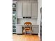 Cozy office nook with built-in shelving, workspace, and natural light is perfect for working from home at 400 N Church St # 422, Charlotte, NC 28202