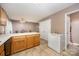 Kitchen with extended countertop bar facing an eat-in dining area, providing ample seating space at 401 Yadkin St, Granite Quarry, NC 28072