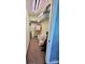 Walk-in closet providing ample shelving and storage solutions for organization and convenience at 401 Yadkin St, Granite Quarry, NC 28072