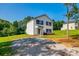 Two-story home with a gravel driveway at 415 Kickapoo Ave, Gastonia, NC 28056