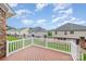 Backyard features a deck with white railings and green grass at 5052 Ashley Pl, Bessemer City, NC 28016