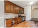 Well-equipped kitchen with wooden cabinetry, stainless steel appliances, and granite countertops at 5052 Ashley Pl, Bessemer City, NC 28016