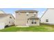 Backyard features a well maintained lawn and patio at 5160 Thomasville Dr # 123, Belmont, NC 28012