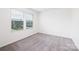 Well-lit room with plush carpet, neutral walls, and a street view at 5160 Thomasville Dr # 123, Belmont, NC 28012