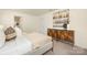 Cozy bedroom featuring a comfortable bed, stylish furniture, and soothing decor for a relaxing retreat at 5160 Thomasville Dr # 123, Belmont, NC 28012