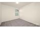 Small, unfurnished bedroom with a window, perfect as a room or home office at 5160 Thomasville Dr # 123, Belmont, NC 28012