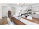 Well-lit dining area with granite countertops and stainless steel appliances in a modern kitchen at 5160 Thomasville Dr # 123, Belmont, NC 28012