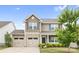Charming two-story home with a two car garage, well-manicured lawn, and inviting front porch at 5160 Thomasville Dr # 123, Belmont, NC 28012