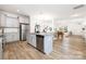 Open-concept kitchen with stainless steel appliances that flows into the living room at 5160 Thomasville Dr # 123, Belmont, NC 28012