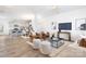 Open concept living room connected to a modern kitchen with stainless steel appliances at 5160 Thomasville Dr # 123, Belmont, NC 28012