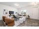 Bright living room with modern decor and plush seating, creating a welcoming atmosphere at 5160 Thomasville Dr # 123, Belmont, NC 28012