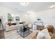 Bright and inviting living room with neutral tones and stylish decor at 5160 Thomasville Dr # 123, Belmont, NC 28012