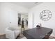 Well-lit home office with a modern desk and a view into the kitchen, perfect for productivity at 5160 Thomasville Dr # 123, Belmont, NC 28012