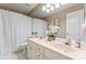 Bathroom with dual sinks and a shower-tub combo at 5233 Fairvista Dr, Charlotte, NC 28269