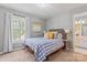 Cozy bedroom with a window view and comfortable furnishings at 5233 Fairvista Dr, Charlotte, NC 28269