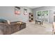 Neutral bedroom featuring comfortable sitting area, large window and gray walls at 5233 Fairvista Dr, Charlotte, NC 28269