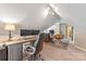Bright bonus room provides ample space for both office and lounge areas at 5233 Fairvista Dr, Charlotte, NC 28269