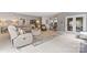 Spacious living room features a neutral color palette, comfortable seating, and an open floor plan at 5233 Fairvista Dr, Charlotte, NC 28269