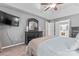 A spacious main bedroom features neutral walls and a dresser with a decorative mirror at 5233 Fairvista Dr, Charlotte, NC 28269