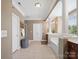 Spacious bathroom featuring tile floors, walk-in closet and separate bath at 538 Fairwoods Dr, Huntersville, NC 28078