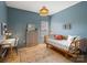 Bedroom features a small desk and rattan furniture at 538 Fairwoods Dr, Huntersville, NC 28078