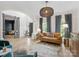 Cozy living area featuring hardwood floors, stylish furniture, with great natural light, and an open layout at 538 Fairwoods Dr, Huntersville, NC 28078
