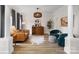 Bright living room with hardwood floors, contemporary furniture, and an open concept design at 538 Fairwoods Dr, Huntersville, NC 28078
