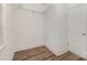 This walk-in closet features laminate flooring, wire shelving, and a window at 6655 Maple Spring Ct, Denver, NC 28037