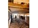 Inside a rustic barn where horses are sheltered, featuring wooden beams and sand ground at 6714 Old Shelby Rd, Vale, NC 28168