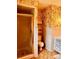 Bathroom featuring a shower, vintage wallpaper, and blue vanity at 6714 Old Shelby Rd, Vale, NC 28168