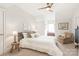 Bedroom showcasing a cozy chair, side table, neutral palette, and plush textures at 7018 Dowington Dr, Charlotte, NC 28277