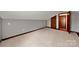 Spacious attic with new carpeting and good lighting; perfect for storage or as a potential bonus room at 725 W Graham St, Shelby, NC 28150