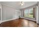 Inviting bedroom with hardwood floors, built-in desk, and plenty of natural light at 725 W Graham St, Shelby, NC 28150
