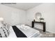 Minimalist bedroom with a console table, clean lines, and a comfortable bed, creating a stylish space at 7913 Old Brook Dr, Sherrills Ford, NC 28673