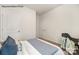 Simple bedroom with a comfortable bed and minimal furnishings, providing a serene and calming space at 7913 Old Brook Dr, Sherrills Ford, NC 28673