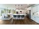 Spacious kitchen boasts a large island, modern appliances, and an adjacent dining area at 8004 Plymouth Dr, Sherrills Ford, NC 28673
