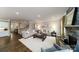Open living room features fireplace, wood floors, and natural light at 8004 Plymouth Dr, Sherrills Ford, NC 28673