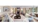 Bright living room showcases fireplace, and access to the outdoor space at 8004 Plymouth Dr, Sherrills Ford, NC 28673