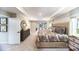 Comfortable main bedroom with neutral tones, trey ceiling, plush carpet, and lots of space at 8004 Plymouth Dr, Sherrills Ford, NC 28673