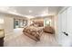 Spacious main bedroom with neutral tones, trey ceiling, plush carpet, and natural light at 8004 Plymouth Dr, Sherrills Ford, NC 28673